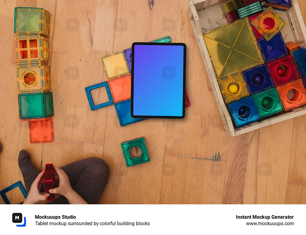 Tablet mockup surrounded by colorful building blocks