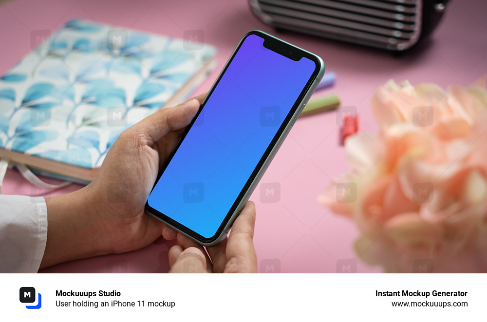 User holding an iPhone 11 mockup