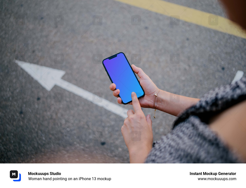 Woman hand pointing on an iPhone 13 mockup