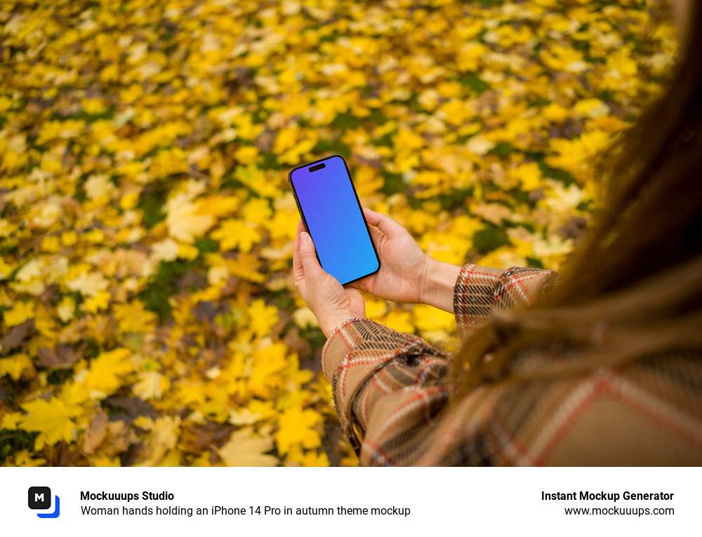 Woman hands holding an iPhone 14 Pro in autumn theme mockup