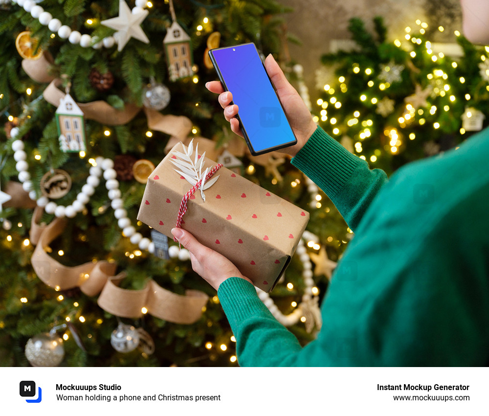 Woman holding a phone and Christmas present