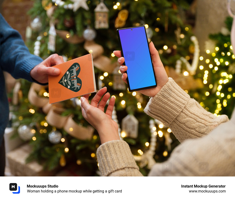 Woman holding a phone mockup while getting a gift card