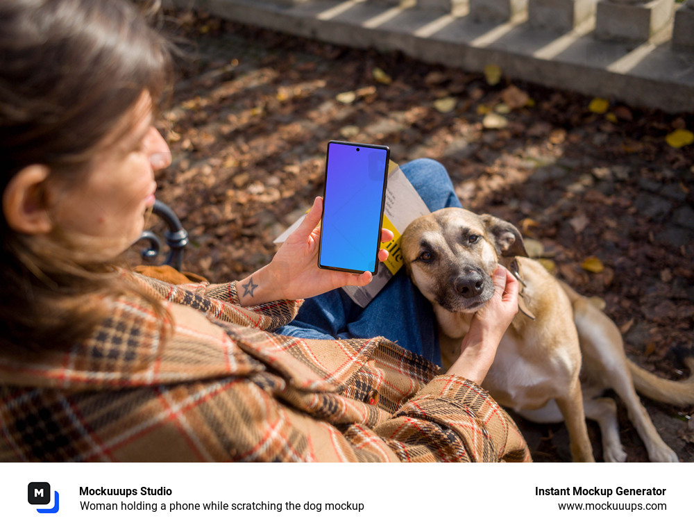 Woman holding a phone while scratching the dog mockup