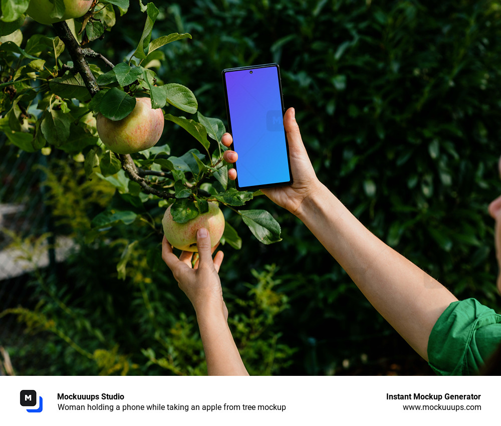 Woman holding a phone while taking an apple from tree mockup