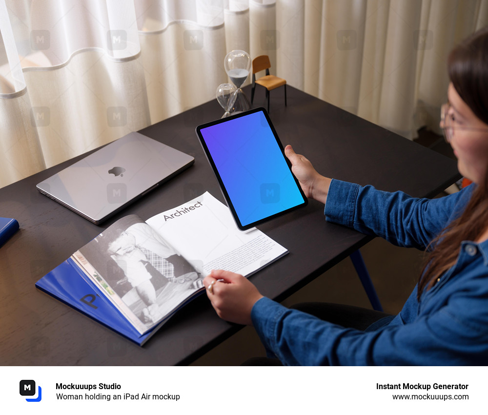 Woman holding an iPad Air mockup 