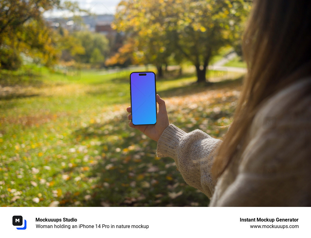 Woman holding an iPhone 14 Pro in nature mockup