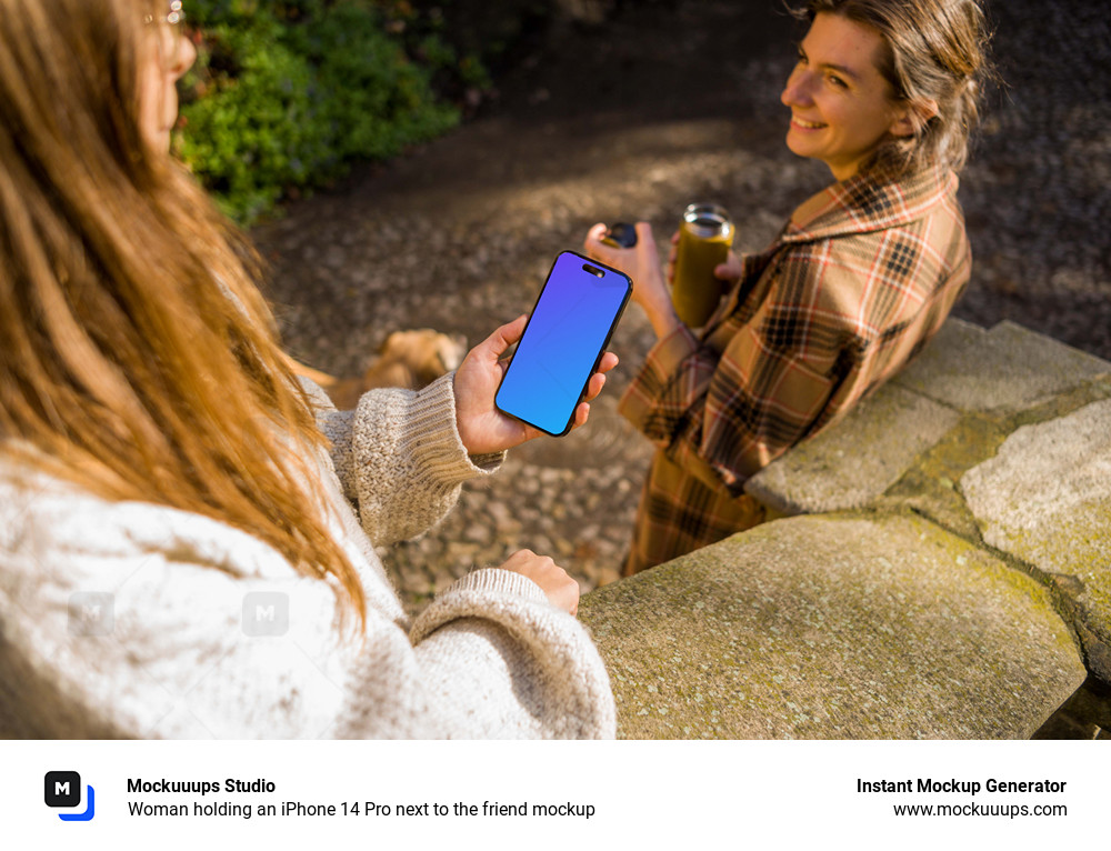 Woman holding an iPhone 14 Pro next to the friend mockup