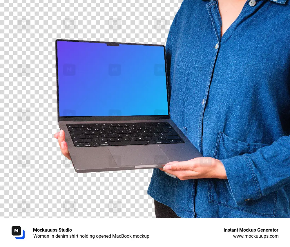 Woman in denim shirt holding opened MacBook mockup