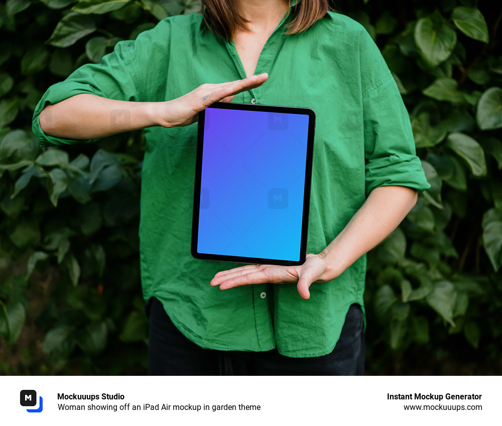 Woman showing off an iPad Air mockup in garden theme