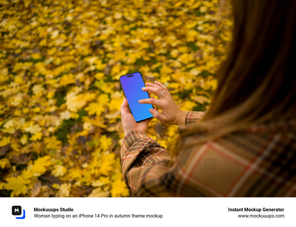 Woman typing on an iPhone 14 Pro in autumn theme mockup