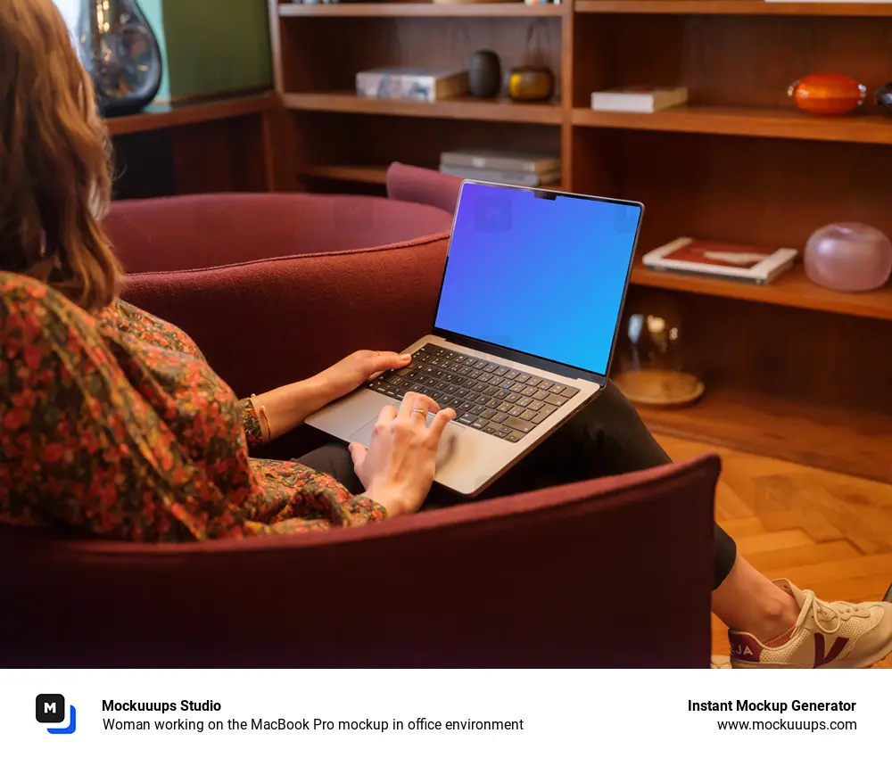 Woman working on the MacBook Pro mockup in office environment