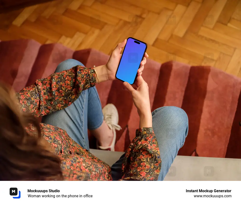 Woman working on the phone in office