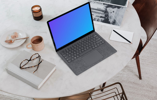 Microsoft Surface Laptop mockup on the table