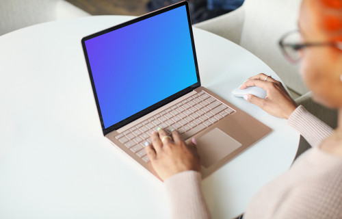 Mockup of a Woman Using Windows Laptop