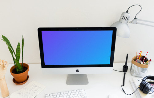 Perspective view of iMac mockup in the office