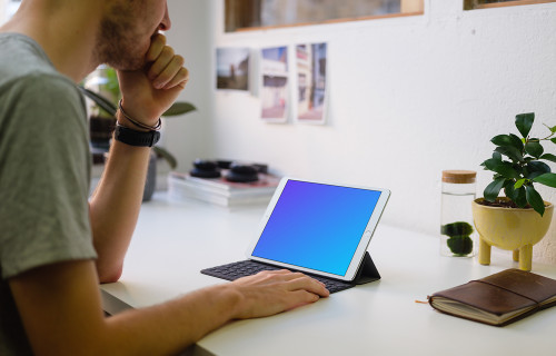 Young man working on the iPad Pro mockup