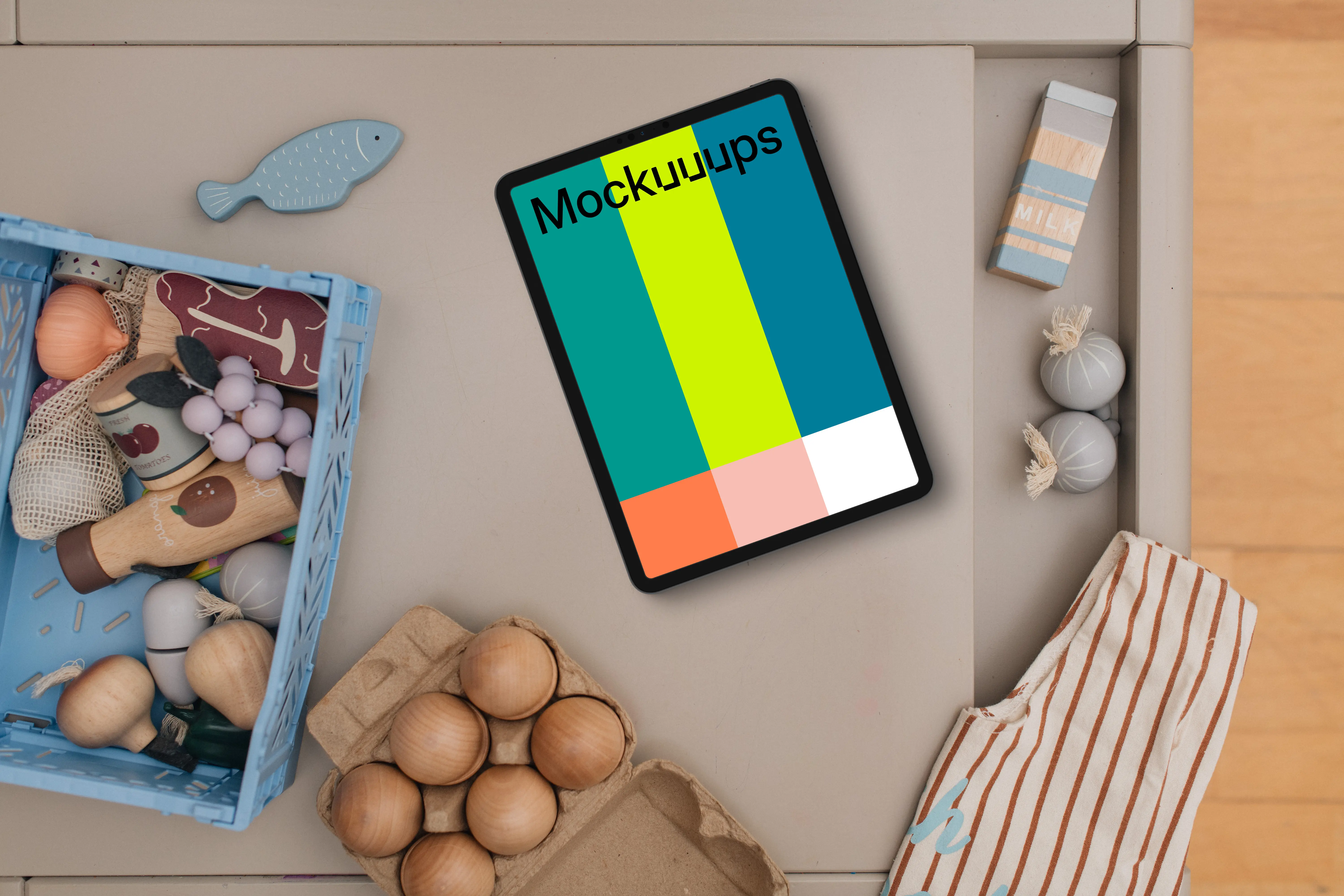 Tablet mockup with children's toys