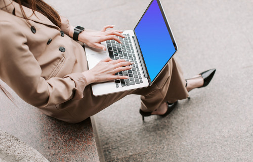Business lady using a MacBook Pro mockup