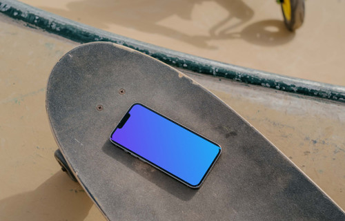  iPhone 13 Pro mockup on a skateboard