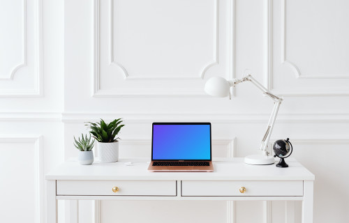 Laptop mockup on a table with a white background