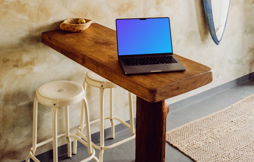 MacBook Pro mockup on a dining table