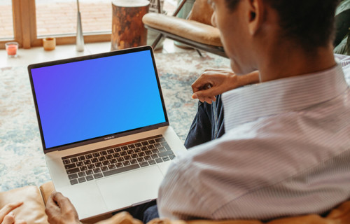Man using a MacBook Pro mockup