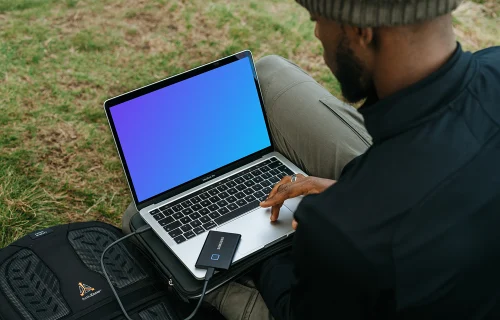 Man woking on MacBook Pro mockup