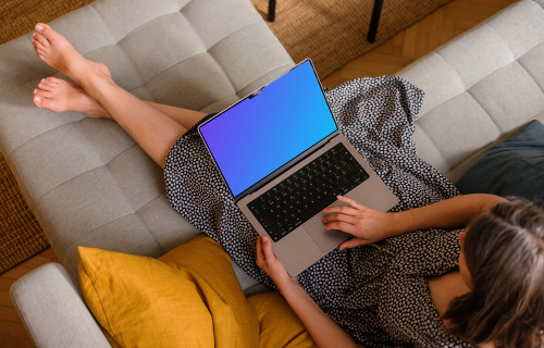 Woman working on a MacBook pro 14 mockup