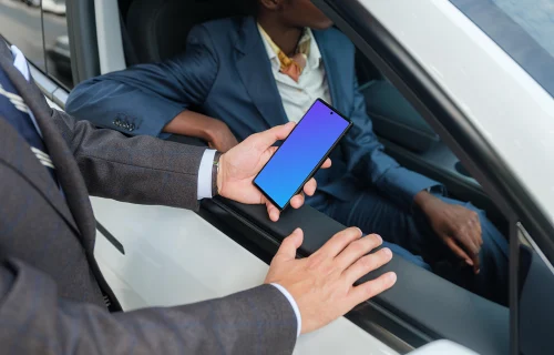 Businessman holding a Google Pixel 6 mockup