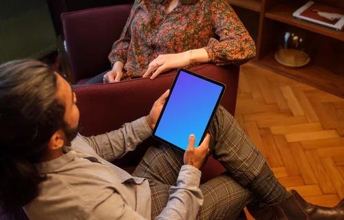 Co-workers in the office with iPad mockup