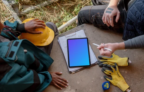 Construction workers using an iPad mockup