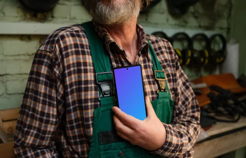 Crafter holding a phone mockup