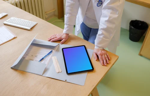 Doctor standing next to the iPad mockup