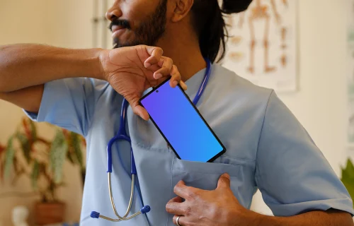 Doctor taking Google Pixel 6 out of his pocket