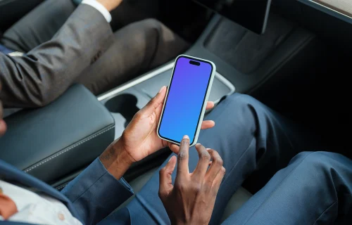 Entrepreneurs in Tesla with iPhone 14 Pro mockup