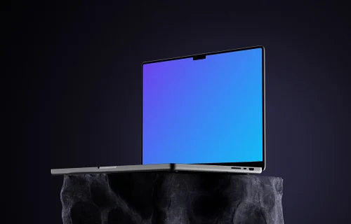 Free MacBook Pro mockup on stone pedestal