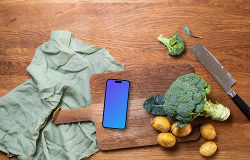 Verduras frescas con iPhone mockup