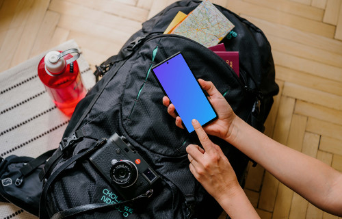 Hand pointing on a Google Pixel mockup