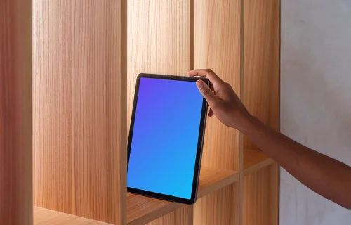 iPad Air mockup held against a wooden shelf