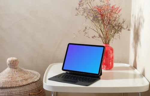 iPad Air mockup on a cozy home table with a decorative vase