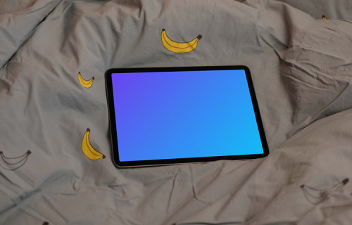 iPad Air mockup on bed sheets 
