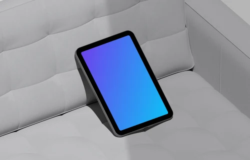 iPad Mini mockup on modern sofa