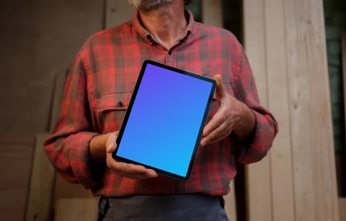 iPad mockup in man hands