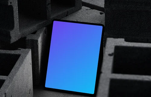 iPad Pro mockup placed on textured concrete blocks