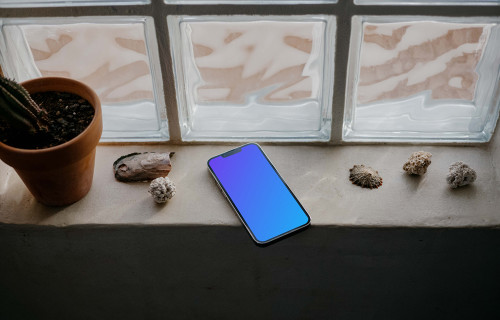 iPhone 13 Pro mockup by a window
