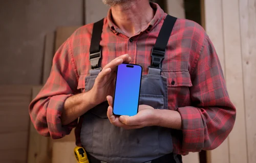 iPhone 14 Pro held by a crafter
