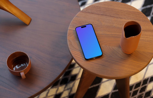 iPhone 14 Pro mockup on a side table