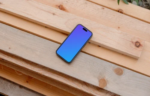 iPhone 15 Pro mockup on wooden boards