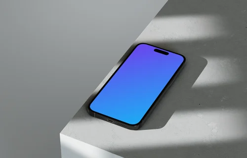 iPhone 16 mockup on textured marble with dynamic shadows