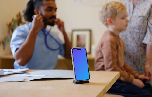 iPhone mockup in the children's doctor's office